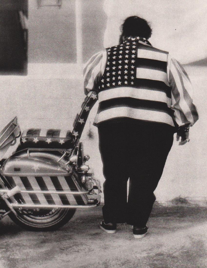 BURK UZZLE - Daytona Beach, Florida: Artist: BURK UZZLE Print Title: Daytona Beach, Florida Printing Date: 1985 Medium: Sheet-fed Gravurer Printed in NANCY, France Image Size approx. 7" x 9.5" Burk Uzzle is an American photojournalist, p