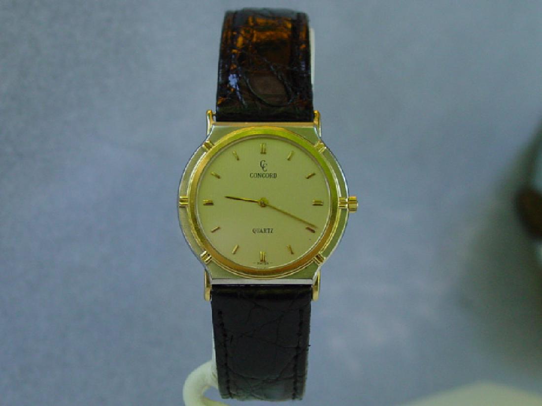 CONCORD | 15-81-217 Quartz | 1980: Watch: Mens Vintage 18k & Stainless Steel Concord Wristwatch Manufacturer: Concord Condition: Very Good Model: 15-81-217 Size: 30MM Movement: Quartz Serial Number: 881858 Case: 18k & Stainless Steel C