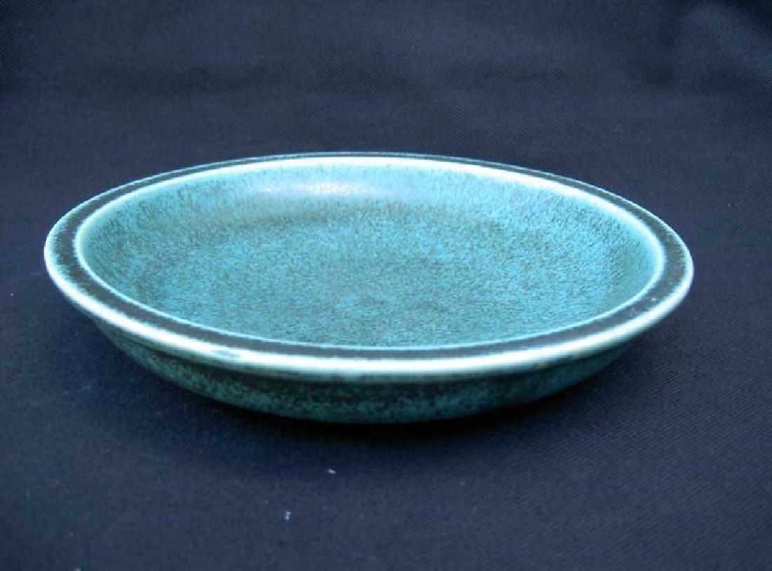 Danish Saxbo Bowl: Danish Saxbo bowl of flatted shape. Profiled rim and hare’s fur glaze, the colour a cold green, resembling the green used on Swedish Argenta ware. Yin-Yang mark, probably 1930s. Diam: “ 7 ½ /19,