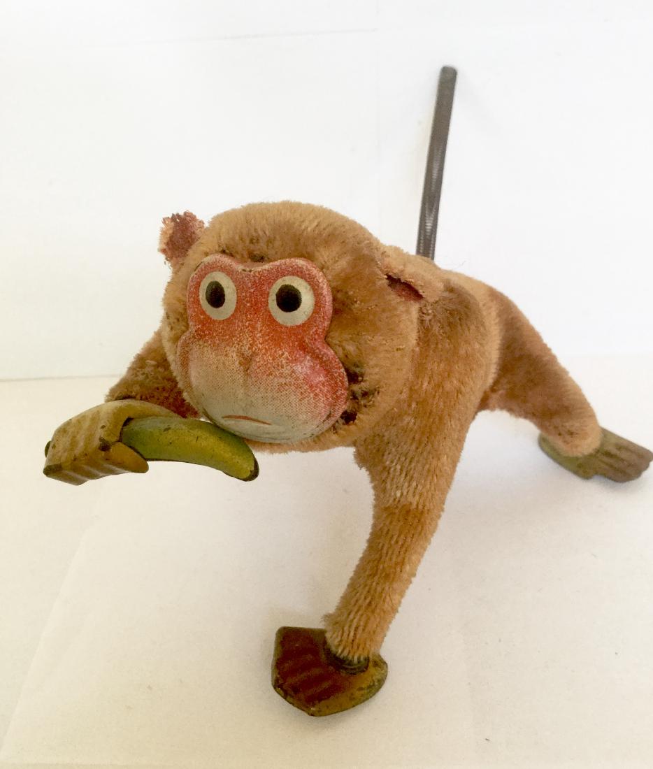 old monkey toy with banana