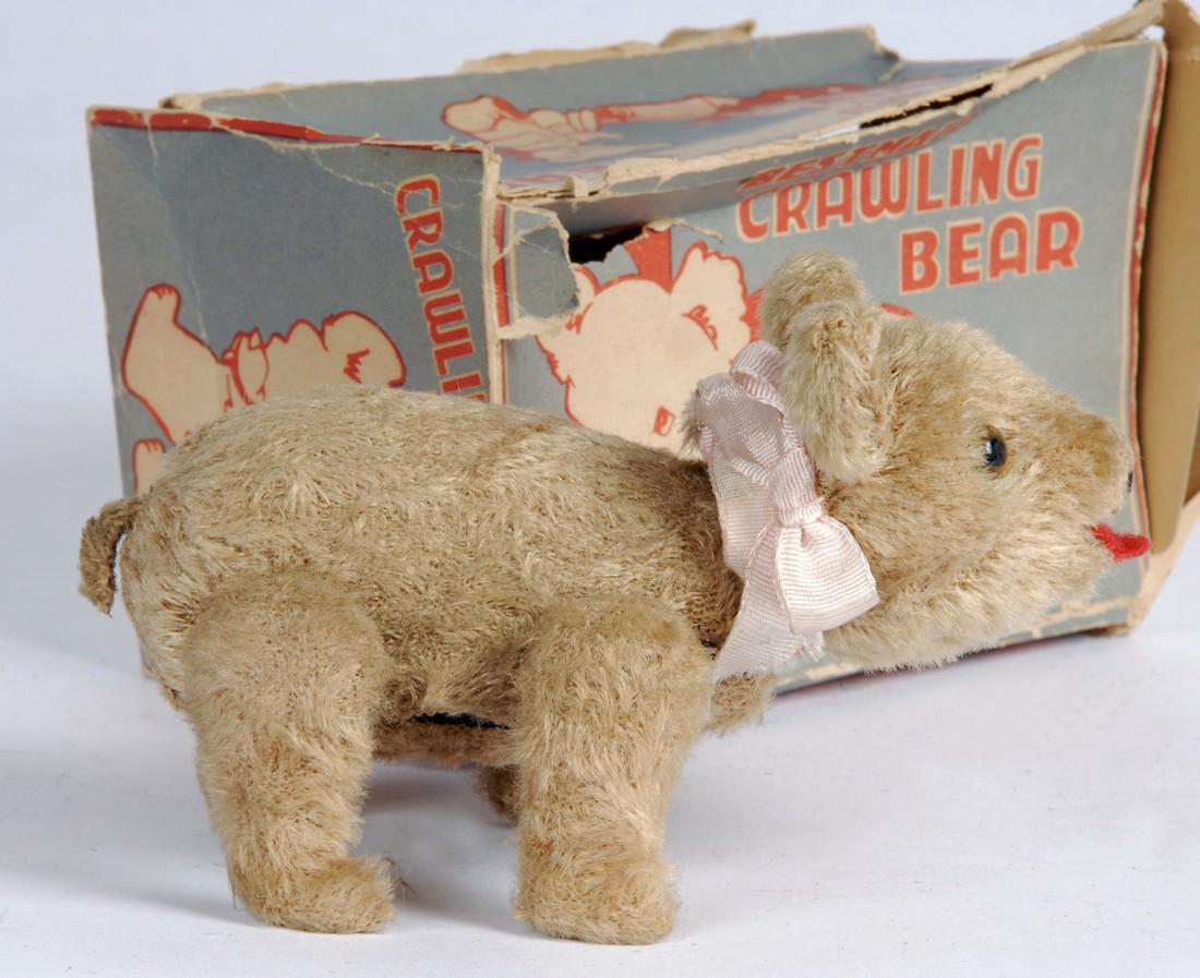 Crawling Bear Wind Up Toy by Bestmaid Toys: Crawling Bear Wind Up Toy by Bestmaid Toys, Plush over Tin with Original Ribbon, Original Box Rough, Trademark TT, Made in Japan, Bestmaid Toys, 1950's. 3 1/2" tall x 3" wide x 6" long Please note tha