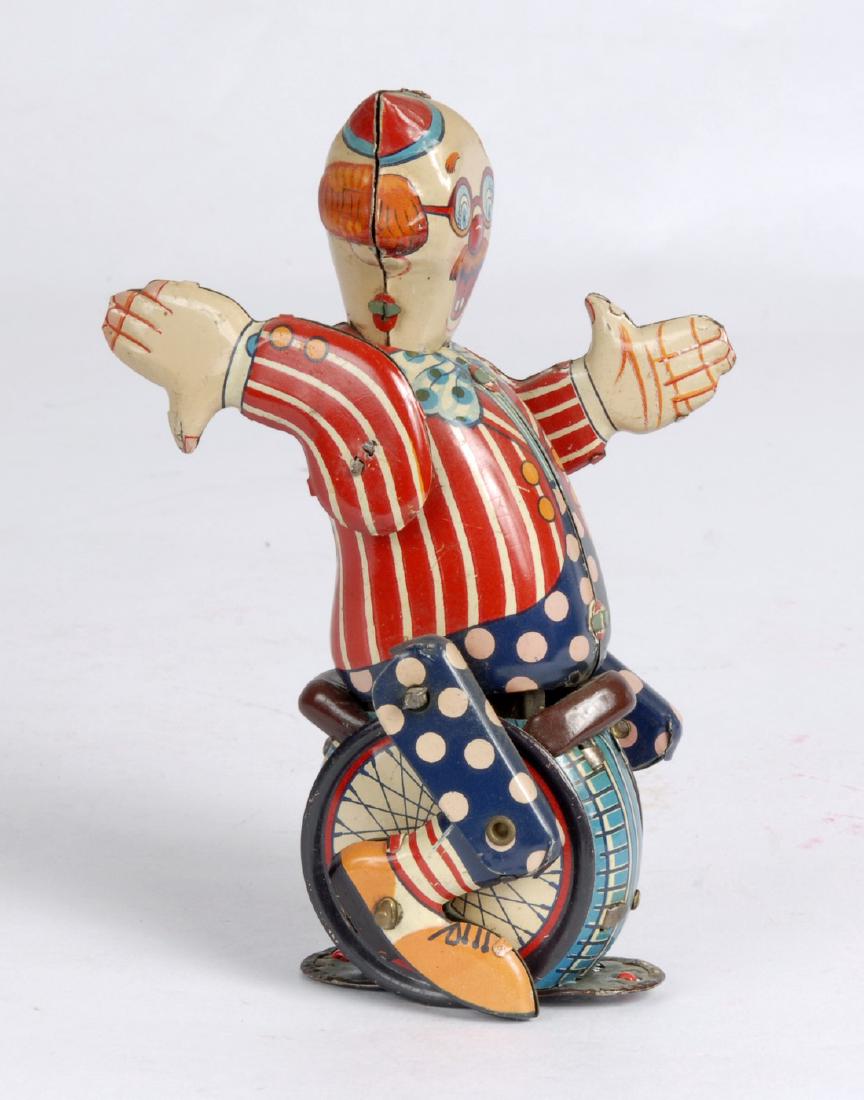 Clown Riding Unicycle Wind Up Toy (1 of 4)
