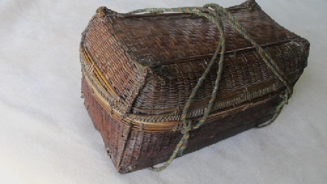Balinese Basket: Vintage Woven Balinese Basket. 16”L x 10”W x 8-1/2”T Please note that this lot has a confidential reserve. When you leave a bid in advance of the auction, submit your maximum. Jasper52 will bid 