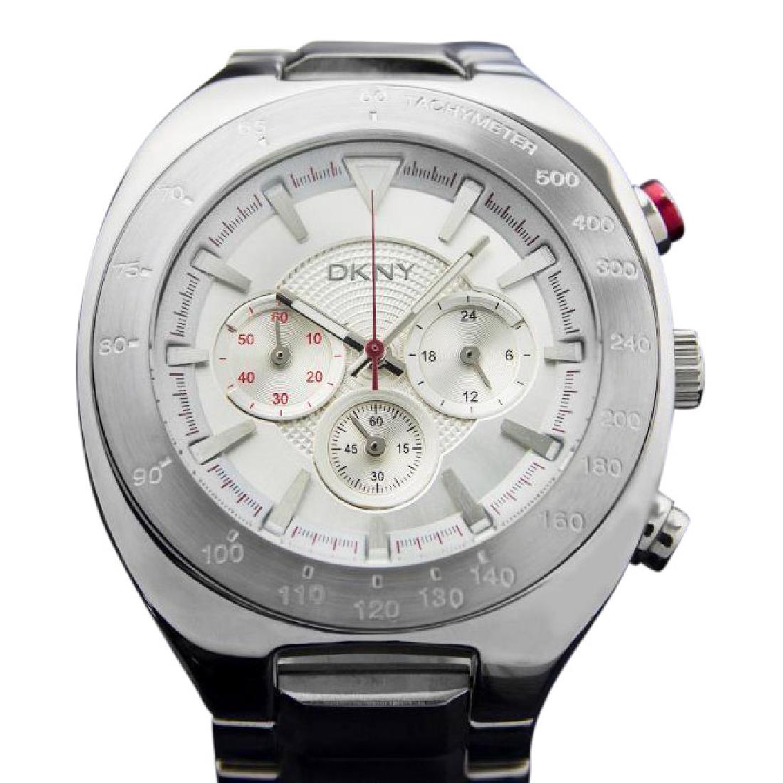 DKNY | Large Mens Chronograph Quartz| 2000: Watch: DKNY Large Mens Chronograph Quartz Watch, Model NY1361 Brand: DKNY Gender: Men's Style: Luxury: Sport Styles Features: Chronograph Year of Manufacture: 2000 Movement: Precision Japanese Movemen