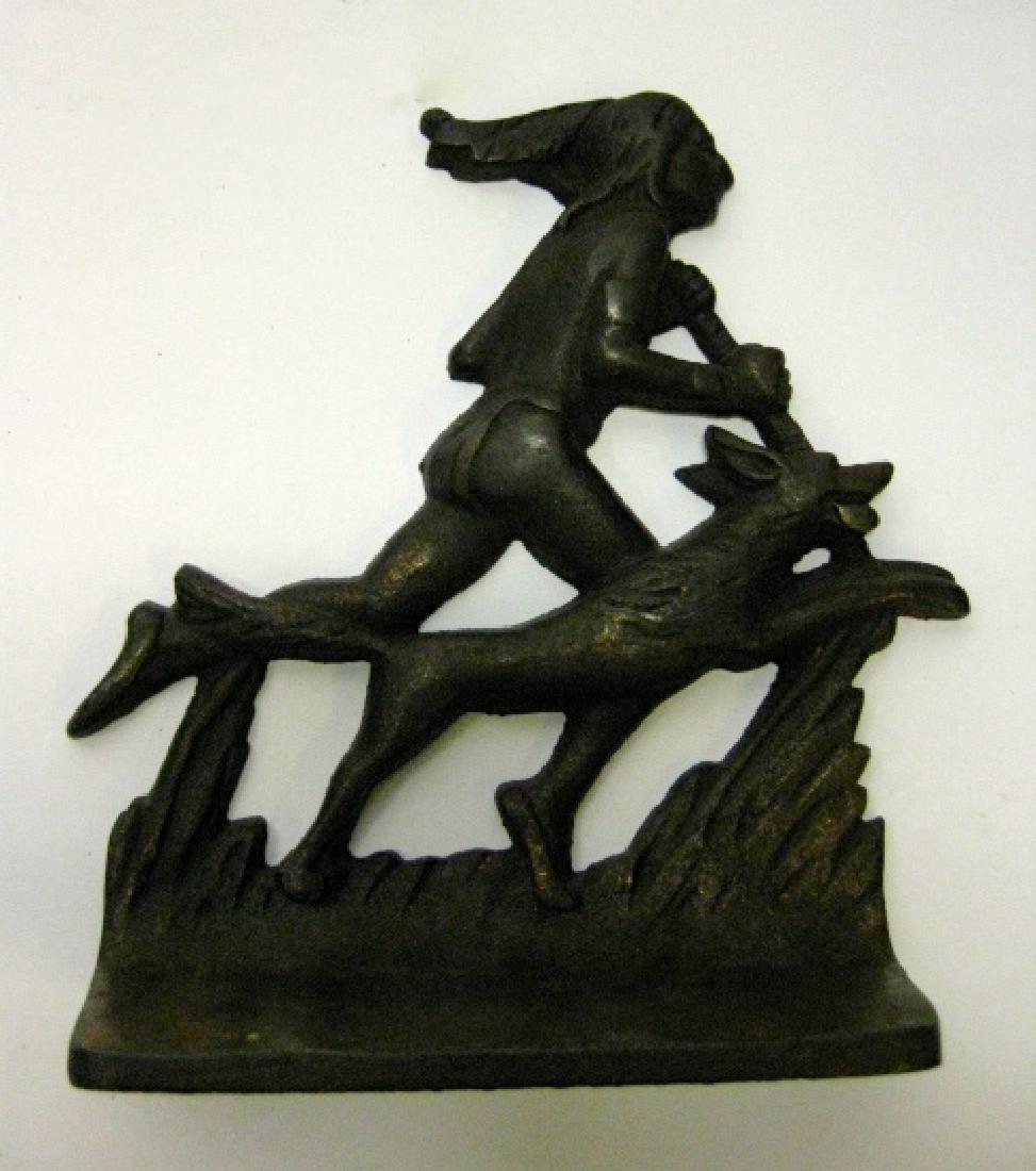 Cast Iron Running Indian & Dog Bookends: Cast Iron Running Indian and Dog Bookends. Nice, but one bookend is missing the Indian's left foot. Please note that this lot has a confidential reserve. When you leave a bid in advance of the auction