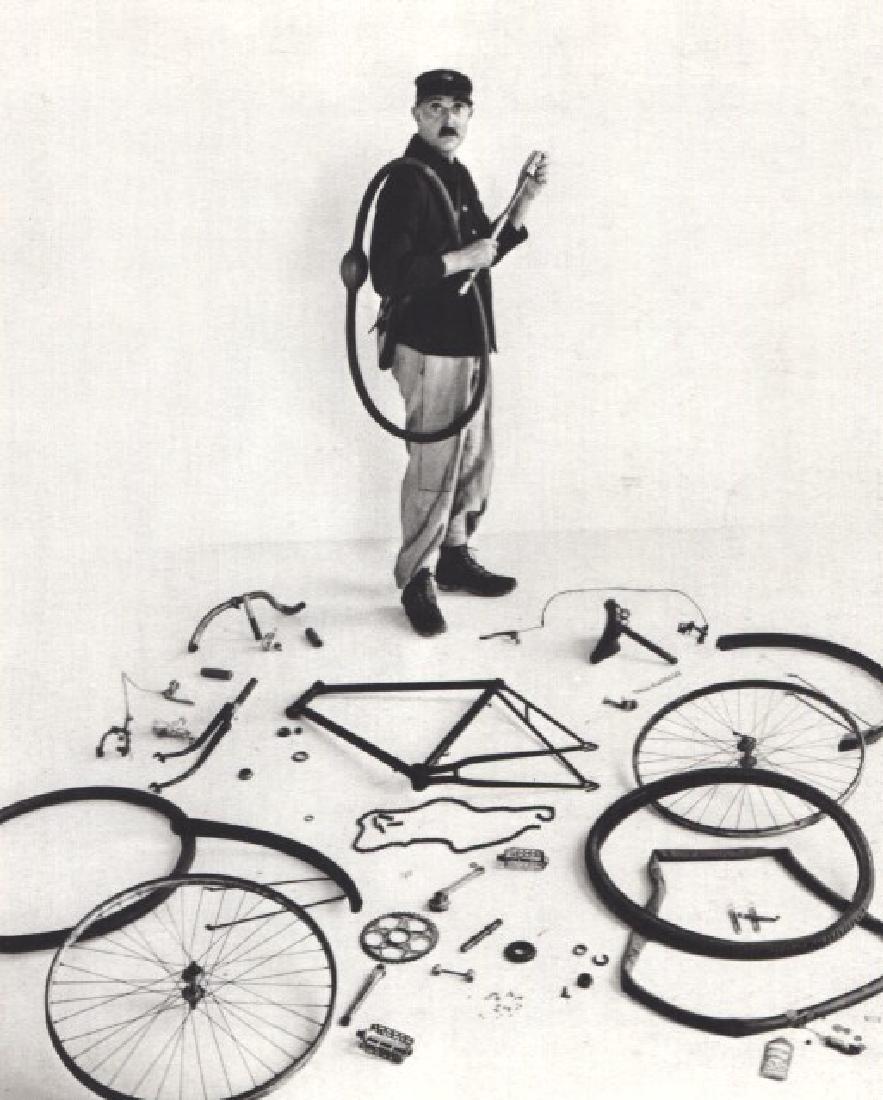 ROBERT DOISNEAU - Jacques Tati and his Bicycle, 1949: Artist: ROBERT DOISNEAU Print Title: Jacques Tati and his Bicycle, 1949 Printing Date: 1982 Medium: Sheet-fed Gravure Printed in France Image Size: 5" x 6" Robert Doisneau was a French photographer. S