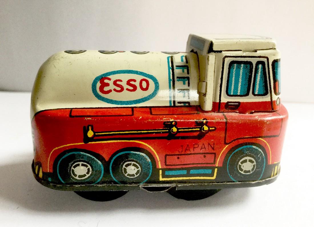 "ESSO" Delivery Truck Wind Up Toy: ESSO Delivery Truck Wind Up Toy, Tin Litho with Built in Key, Japan, 1950's, 1 1/2" tall x 1 5/8" wide x 2 3/8" long Please note that this lot has a confidential reserve. When you leave a bid in advan