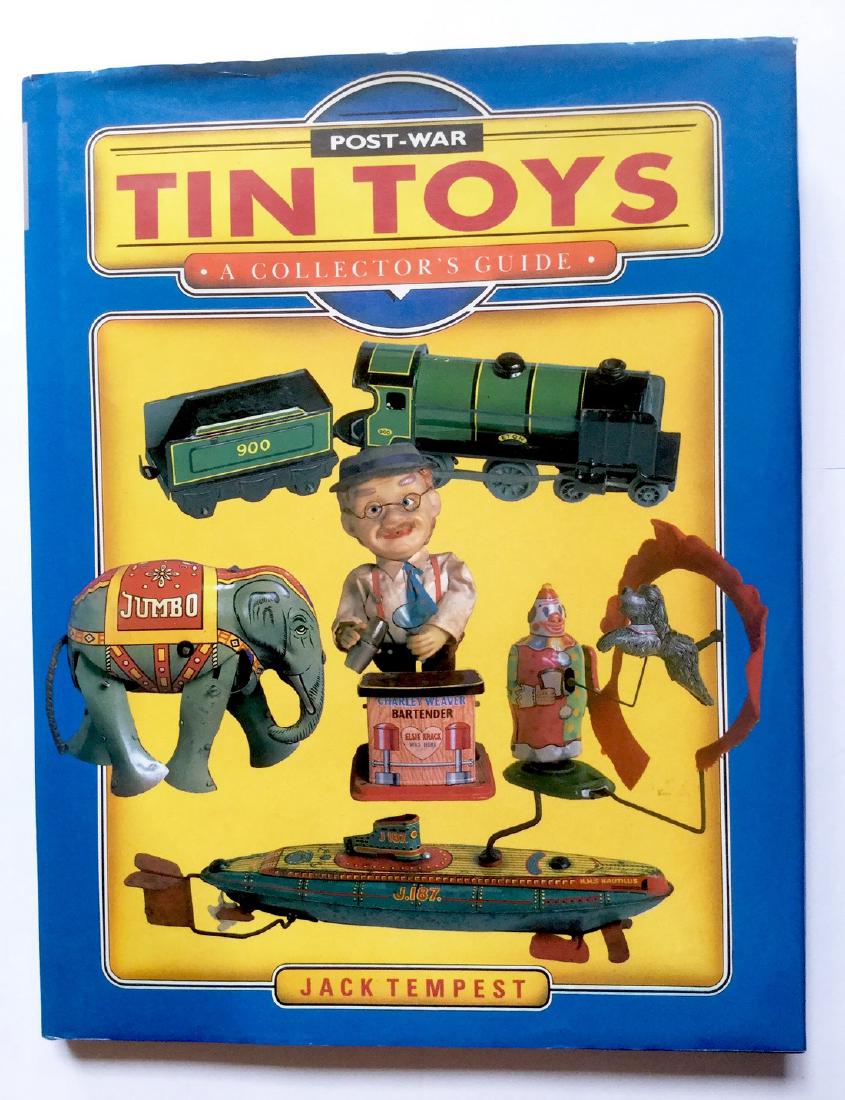 "Tin Toys" Post War by Jack Tempest: Tin Toys Post War by Jack Tempest, Copyright 1991, Has Jacket, 11 1/4 tall x 8 7/8" wide Please note that this lot has a confidential reserve. When you leave a bid in advance of the auction, submit yo