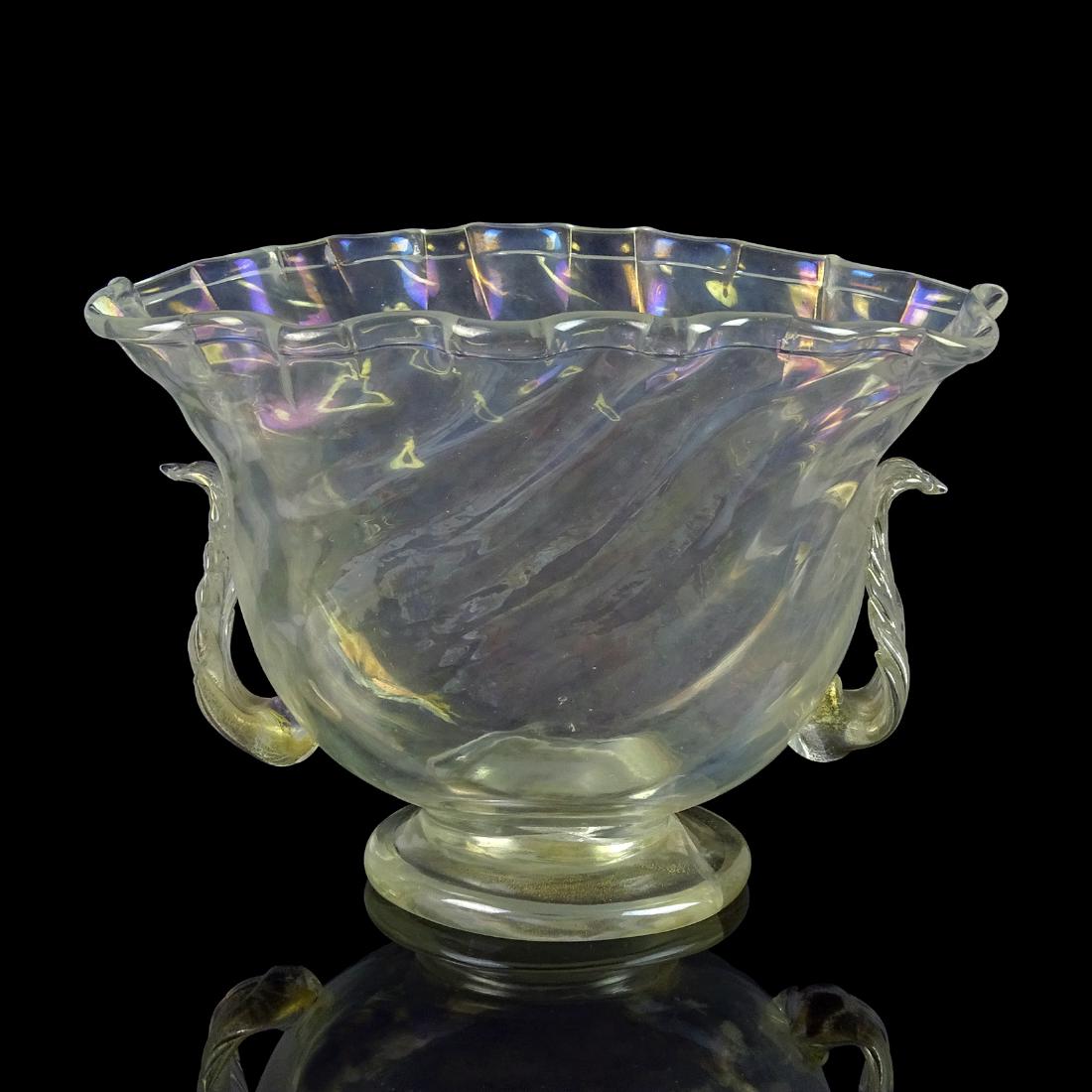 Murano Antique Iridescent Gold Flecks Flower Vase: Antique Murano hand blown iridescent and gold flecks Italian art glass flower vase with leafs. In the manner of Seguso Vetri D' Arte, circa 1930s. For accuracy, the foot has a stress crack. Sold as is