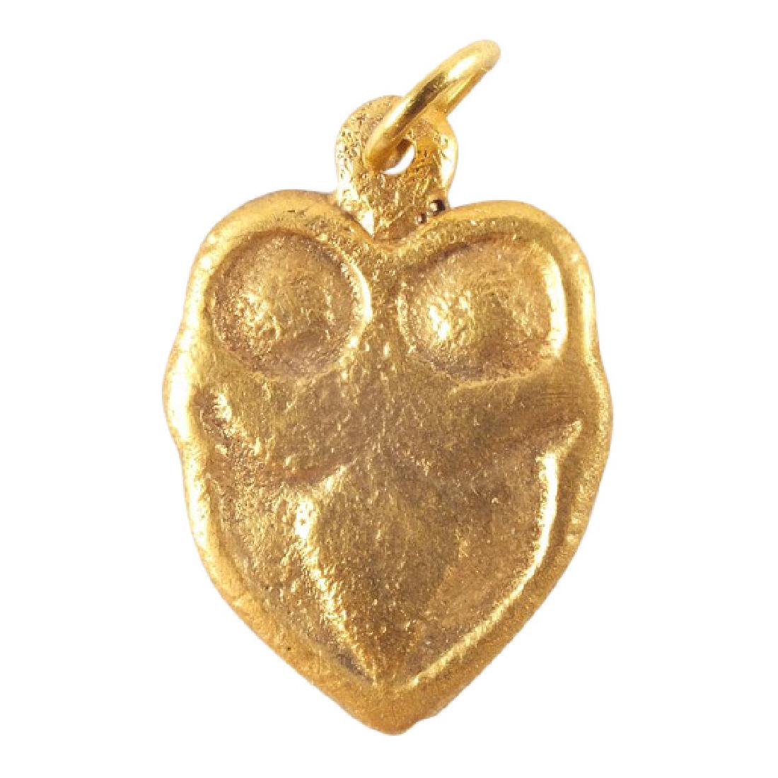 Fine Large Ancient Viking Heart Pendant C.900-1000 AD: Gilt bronze. Over 1” height. Broad bordered heart with the iconic trefoil below two low domes. Foliate designs were favored by Vikings and incorporated into about half of heart pendants. The heart s