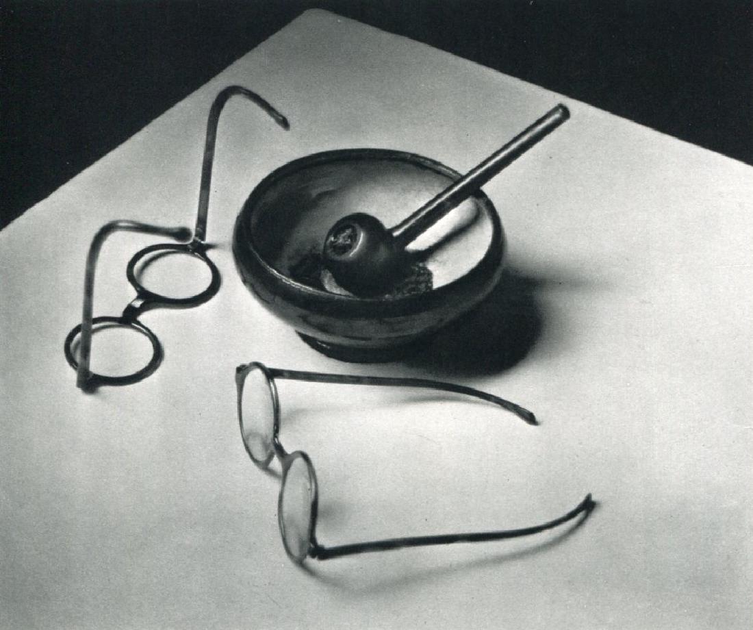 ANDRE KERTESZ - Mondrian's Glasses and Pipe, 1926 Paris: Artist: ANDRE KERTESZ Print Title: Mondrian's Glasses and Pipe, 1926 Paris Medium: Sheet-Fed Gravure Printed in 1972 by Braun - Mulhaus - France Image size (inches) approx. 7 x 6" Andre Kertesz, born