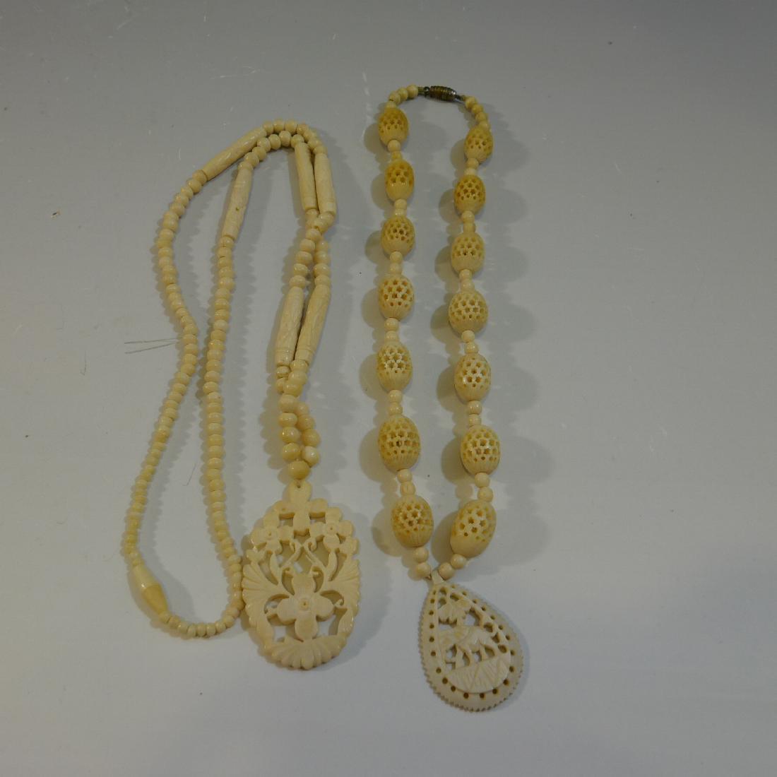 Two Carved Bone Necklace: Two carved necklace. Intricately carved. Early 1900s. Total weight 55 grams. Length - 69 cm for one, and 40 cm for the other. Please note that this lot has a confidential reserve. When you leave a bid