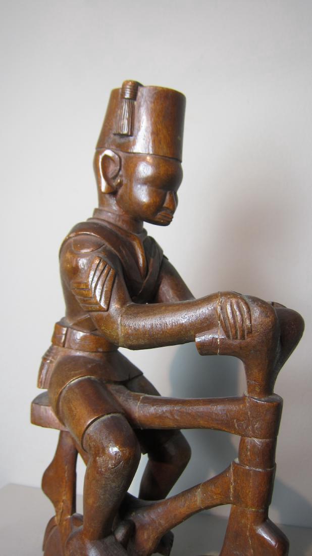 Colonial Soldier on a Bicycle (1 of 6)