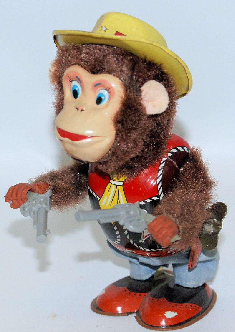 Vintage 1950's Wind-up MONKEY THE SHERIFF 2 Pistols (1 of 3)