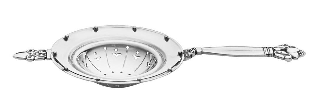 Georg Jensen Acorn Pattern Tea Strainer: George Jensen, Sterling Silver Tea Strainer. Acorn, designed in 1915 by Johan Rohde. 6.75" long. 48 grams. Made post 1945. Please note that this lot has a confidential reserve. When you leave a bid in