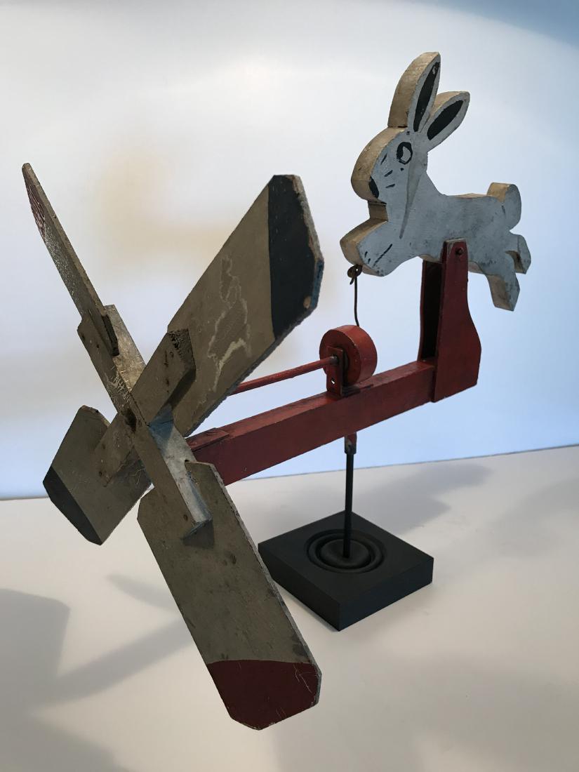Whirligig: Rabbit in nice old painted surface with modern stand included, 18" tall by 17.5" on stand, mid 20th century Please note that this lot has a confidential reserve. When you leave a bid in advance of the