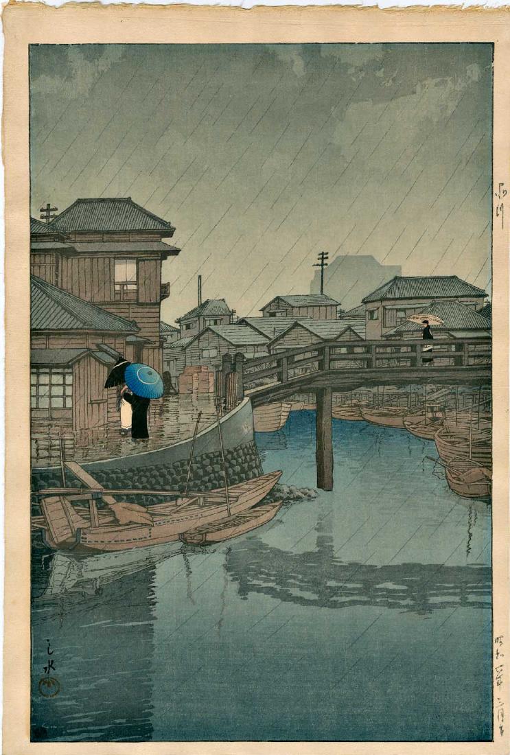 Hasui Kawase: Rainy Season at Ryocimachi, Shinagawa: Hasui Kawase. Rainy Season at Ryocimachi, Shinagawa. 1931, Lifetime edition, published by Watanabe with 6mm seal. 10.25 x 15.25. Japanese woodblock print. Please note that this lot has a confidential 