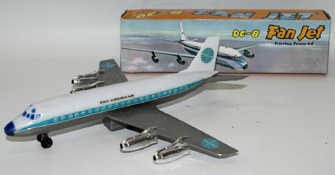 Vintage Friction PAN-AM Pan American DC-8 FAN JET: Vintage Friction Powered Plastic PAN-AM Pan American DC-8 FAN JET Airplane #9094 in the original box. Measures 9-1/2" long, with a 9-1/2" long wingspan. Made by Petrel, Hong Kong. Original old store s