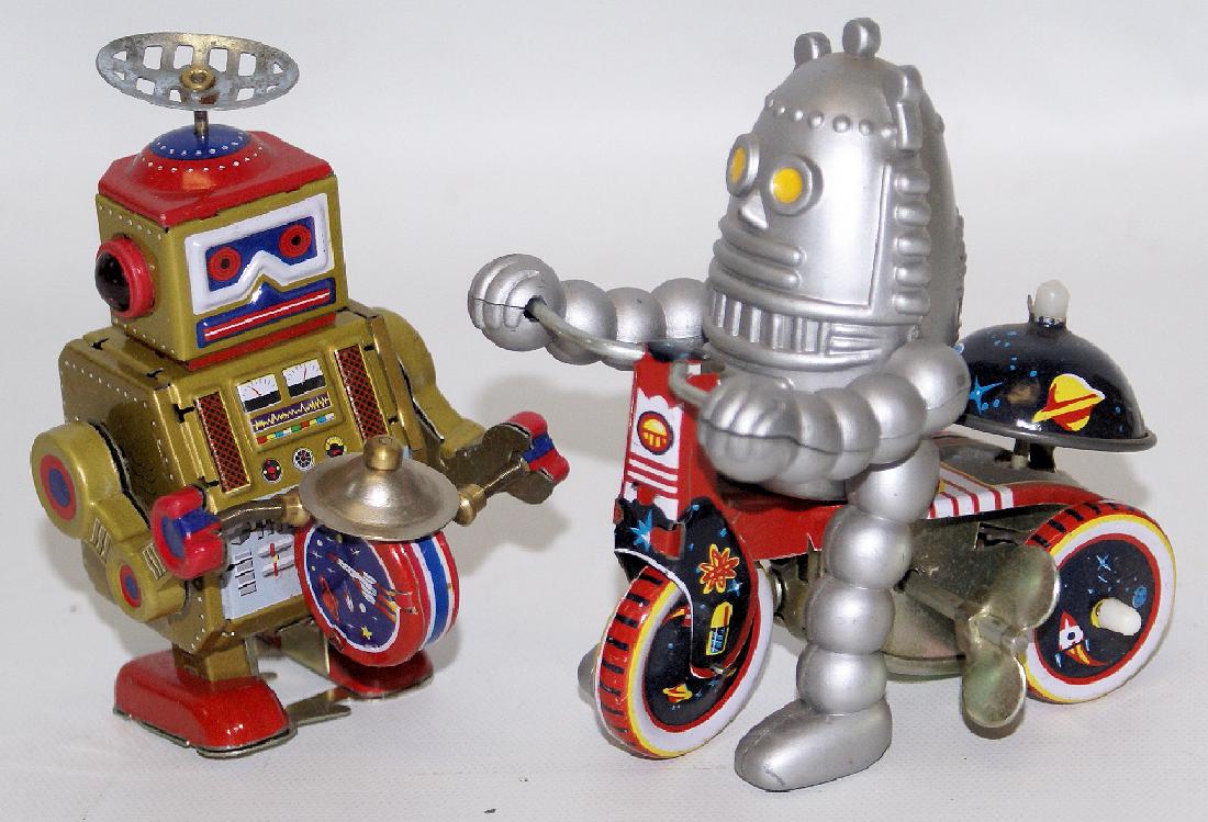 Set of 2 Tin Litho Wind-up Drumming & Bicycling Robots (1 of 1)