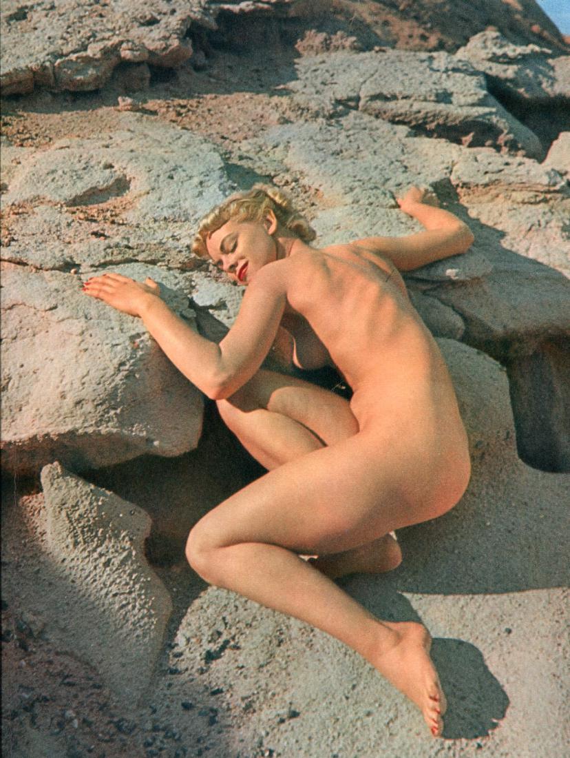 ANDRE DE DIENES - Nude on the Rocks I: Artist: ANDRE DE DIENES Print Title: Nude on the Rocks I Printing Date: 1950s Medium: Sheet-Fed color gravure Printed in France Image Size: 8.5 x 11 inches Andre de Dienes (1913 – 1985) Andre de Die