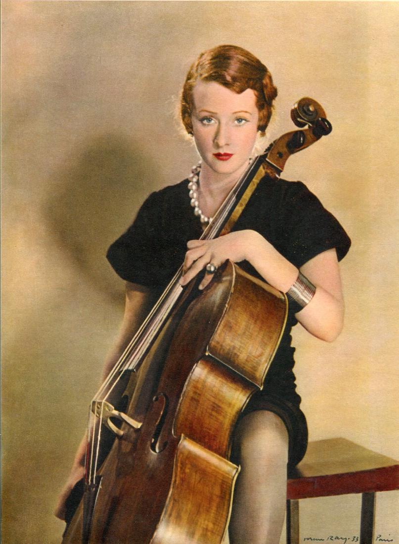 MAN RAY - Femme avec Violoncelle: Artist: MAN RAY Print Title: Femme avec Violoncelle Medium: Sheet-Fed Color Gravure Printed in 1933, Neogravure France Image Size: 8" X 11.5" Man Ray, original name Emmanuel Radnitzky, was born on Aug