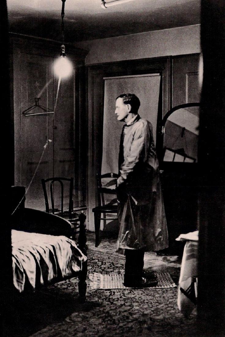 DIANE ARBUS - Backwards Man in His Hotel Room, NYC 1961: Artist: DIANE ARBUS Print Title: Backwards Man in His Hotel Room, NYC 1961 Medium: Heliogravure Printed in 1979, Italy Paper Size: 15 3/4 x 11 5/8 in Image Size: 8.5" x 12.5" Diane Arbus was an Americ