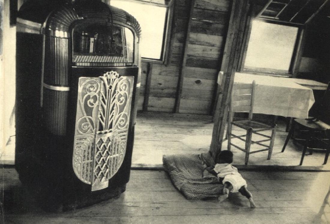 ROBERT FRANK: Cafe, Beaufort, South Carolina: Artist: ROBERT FRANK Print Title: Cafe, Beaufort, South Carolina Medium: Vintage Sheet-fed Gravure Printed in 1958 in France Image Size: 7.5 x 5 inches Robert Frank (b. 1924) is an American photograph