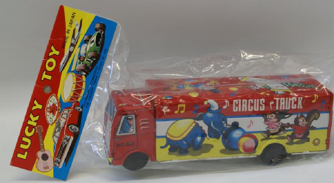 Vintage Tin Lithographed Circus Truck "Lucky Toy": Vintage Tin Lithographed Circus Truck "Lucky Toy", sealed in the original packaging, 8" long, old store stock Please note that this lot has a confidential reserve. When you leave a bid in advance of t