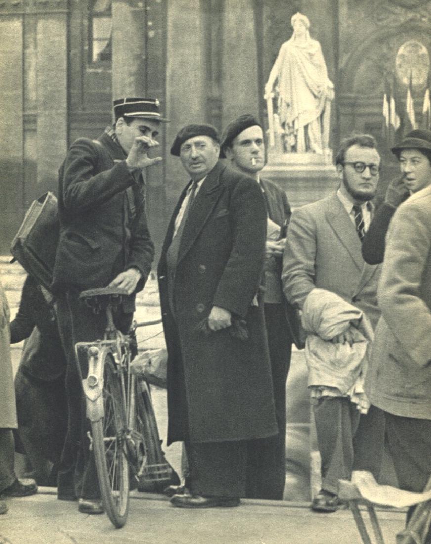 ROBERT DOISNEAU - The Postman Knows!: Artist: ROBERT DOISNEAU Print Title: The Postman Knows! Printing Date: 1956 Medium: Sheet fed copper plate gravure Printing Location: France Image Size: 8 x 10 inches Robert Doisneau was a French phot