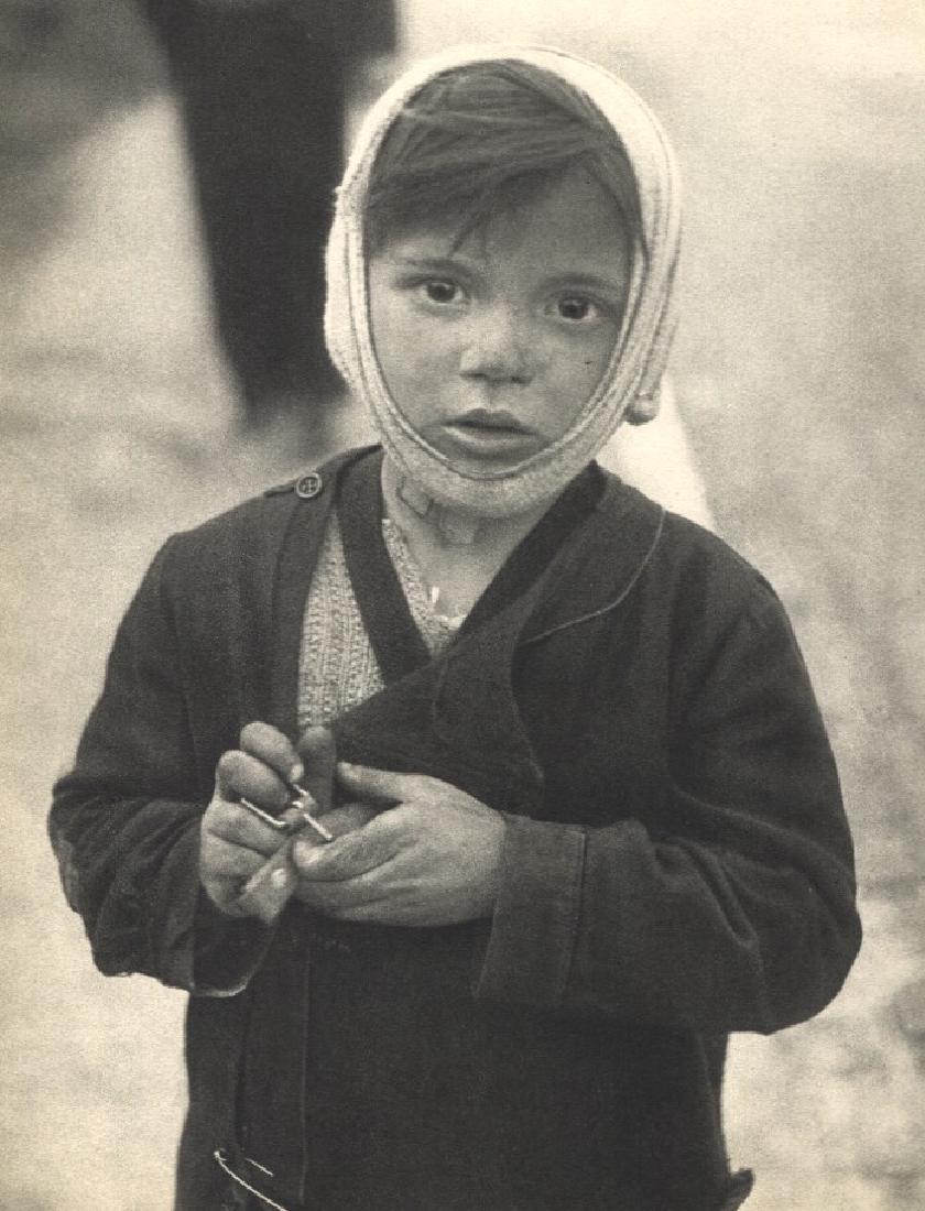 WILLY RONIS - Rue de Menilmontant: Artist: WILLY RONIS Print Title: Rue de Menilmontant Printing Date: 1954Medium: Sheet-fed Gravure Printed by Braun et Cie in France Image Size approx. 7" x 9" Willy Ronis (1910-2009) was a French phot