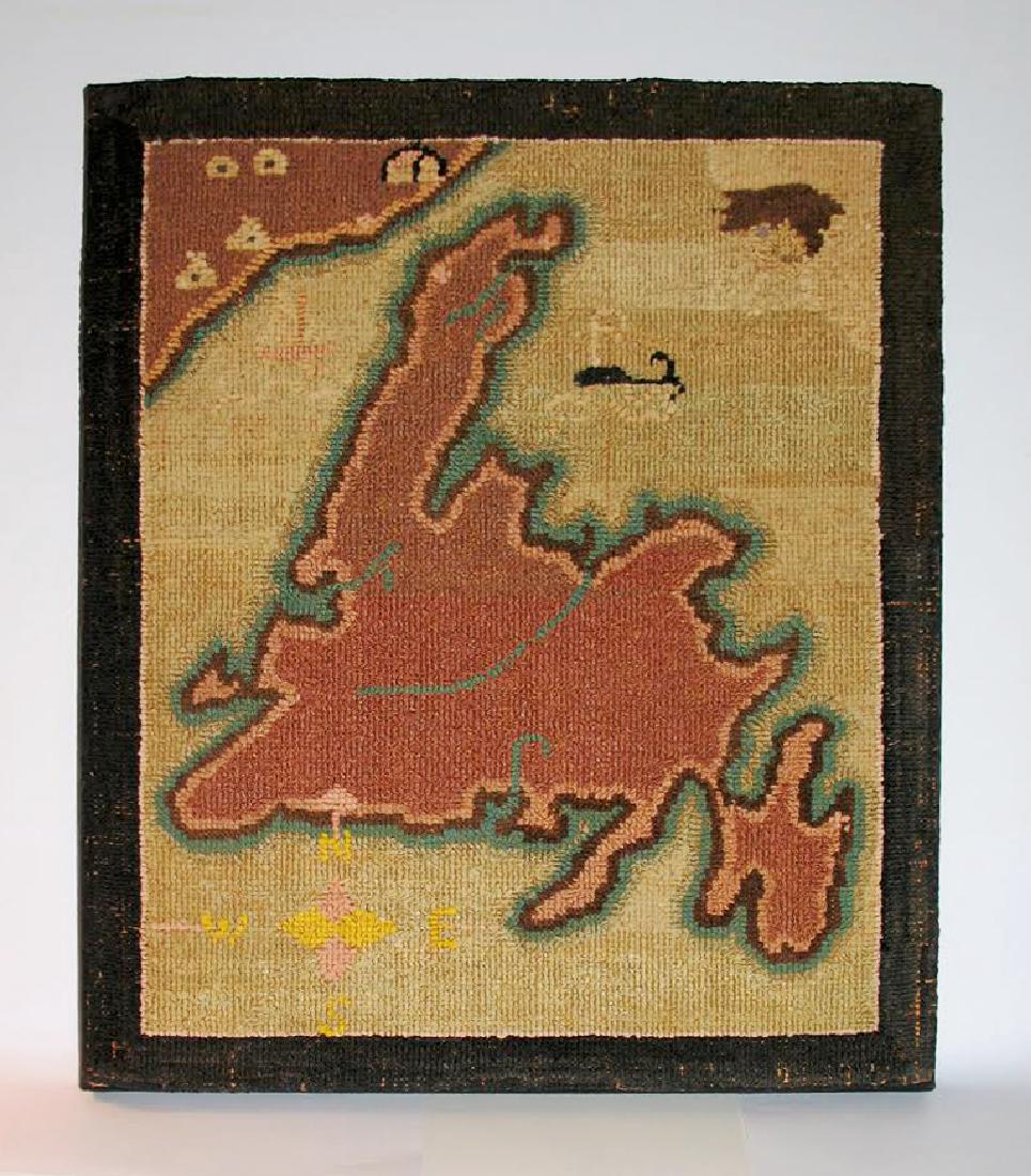 Grenfell Mission Mat, 1920's: Grenfell Mission mat depicting the map of Newfoundland. The map includes a compass rose, the North wind blowing, a spouting whale, a sail boat and village settlements. It is in great original conditio