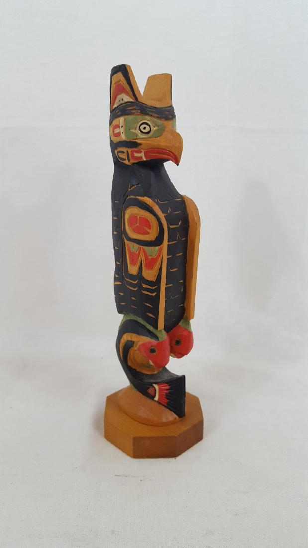 Signed Carved and Painted Totem ca 1960's: Signed carved and painted totem ca 1960's Signed carved and painted totem ca 1960's. Dimensions: 8 1/2" tall. Please note that this lot has a confidential reserve. When you leave a bid in advance of t