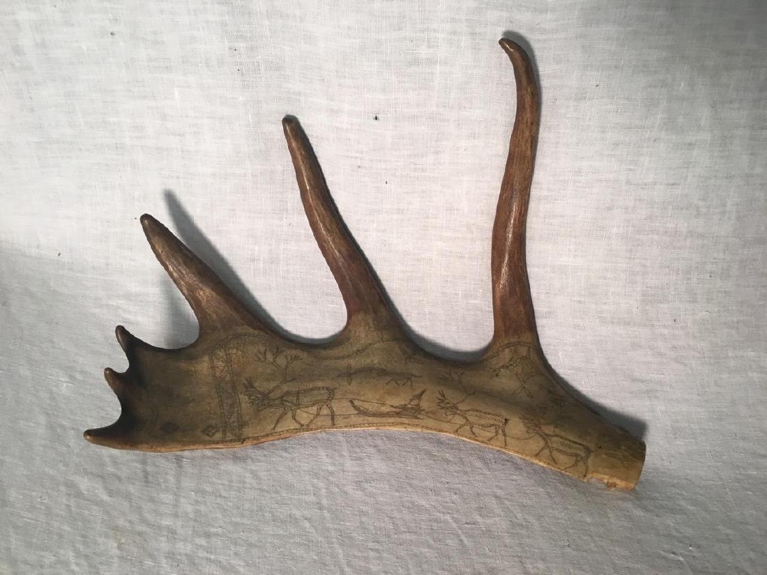 Scrimshaw Elk Antler Tool C.1915: Scrimshaw Elk Antler Tool C.1915 Laplander or Scandinavian. Old mellow surface. - Dimensions: 11.5 x 9” Please note that this lot has a confidential reserve. When you leave a bid in advance of the