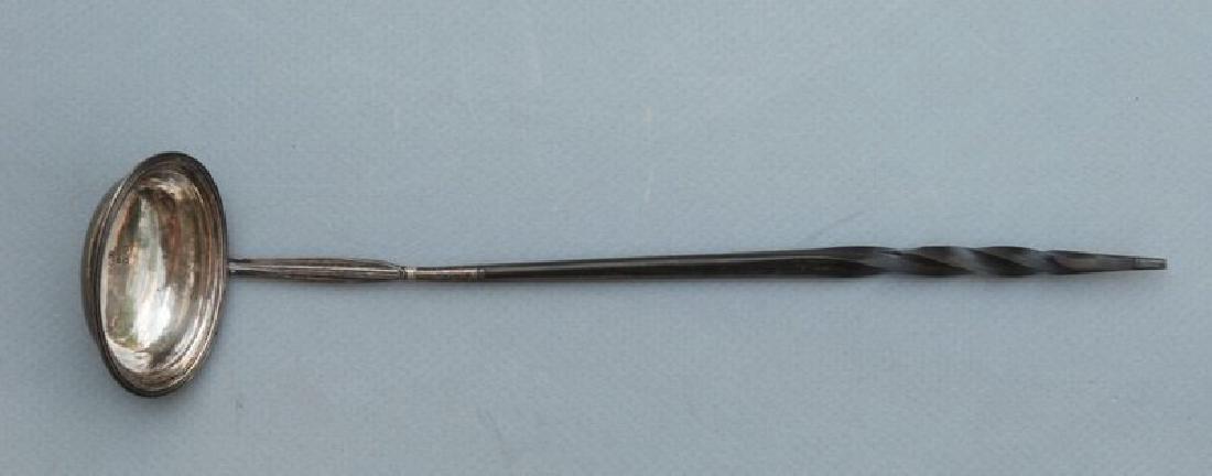 Antique George III Sterling Silver Toddy Ladle, 1789: George III Silver Toddy Ladle, London, 1789. Typical form, first letter of maker's name mark obscured. Having silver bowl and twisted wood handle. 14.5", ebonized bone handle with silver tip Please no