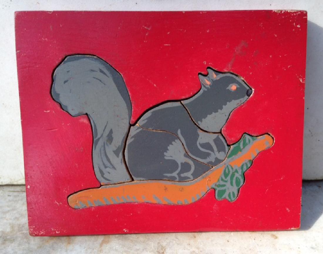 Vintage Hand Made Squirrel Puzzle 1940: C1940 all hand made plywood puzzle in Very Good Condition. 5/8" thick. 6" x 7 1/2" Please note that this lot has a confidential reserve. When you leave a bid in advance of the auction, submit your max
