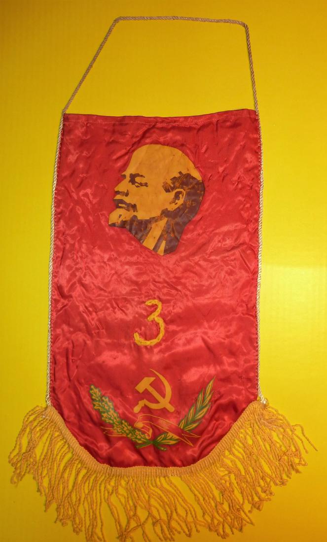 Textile Propaganda Banner of Vladamir Lenin: Circa 1960, from The Ukraine. Approx.10x20 inches edge to edge, to tip of tassels. Bright and clean. overall good condition. Please note that this lot has a confidential reserve. When you leave a bid 