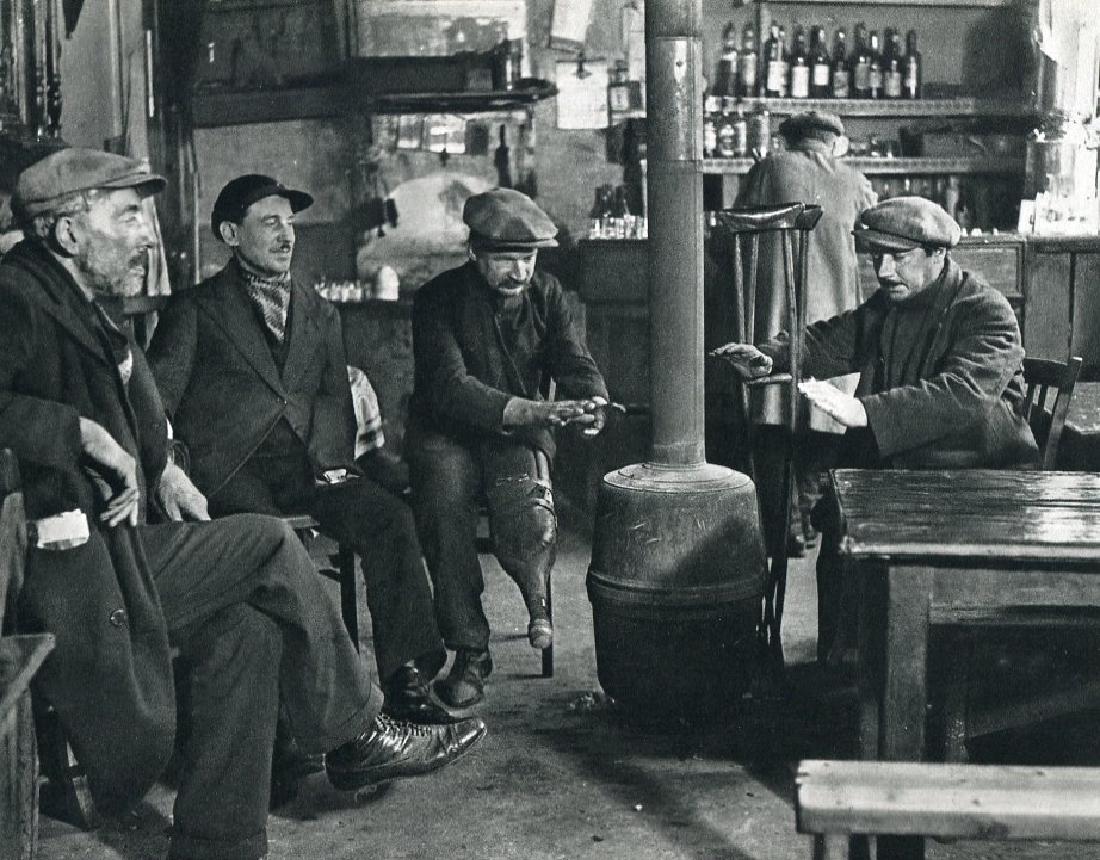 ANDRE KERTESZ - In a Bistro, 1927 Paris: Artist: ANDRE KERTESZ Print Title: In a Bistro, 1927 Paris Medium: Sheet-Fed Gravure Printed in 1972 by Braun - Mulhaus - France Image size (inches) approx. 9 x 7" Andre Kertesz, born Kertesz Andor, w