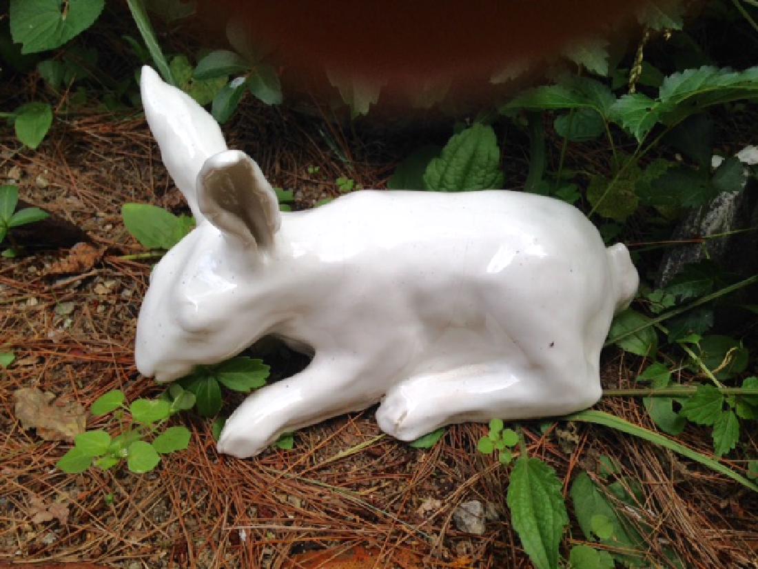 Pottery Rabbit 20th Century: Mid 20thc heavy hand made pottery folk rabbit. Heavy lead glaze. VGC. 9"long. 5 1/2"high at ears. Please note that this lot has a confidential reserve. When you leave a bid in advance of the auction, 