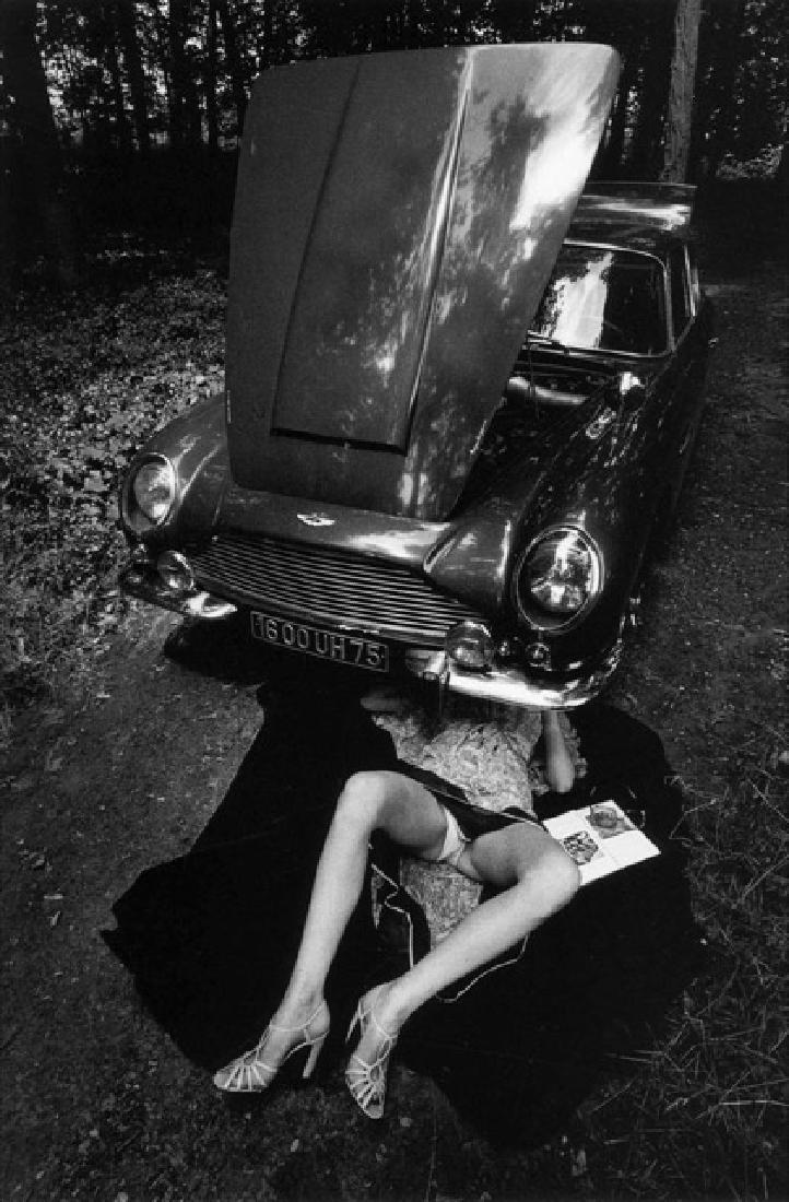 JEANLOUP SIEFF - Under the Car, Bonnet Open: Artist: JEANLOUP SIEFF Print Title: Under the car, bonnet open Paris 1975 Medium: Glossy PhotoLithograph Poster Printer: Taschen (German printers) Printing Date: 1992 Image Size: 11.5" x 16.5" Jeanlou