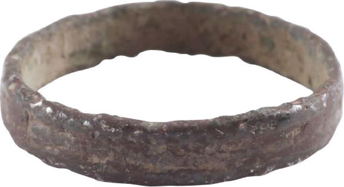 ANCIENT VIKING WOMAN’S WEDDING RING 10th-11th CENTURY: Bronze. Size 2. Narrow round band with irregularities as made (cast). Vikings exchanged rings on the pommel of the groom’s sword. All items purchased are accompanied by a signed and dated Certificat
