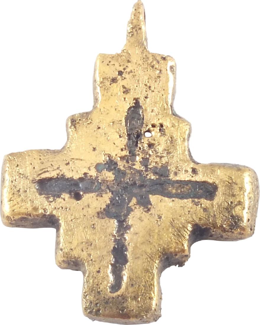 MEDIEVAL PILGRIM’S RELIQUARY CROSS 7th-10th century: 1” tall. Symmetrical form with the center expanded as a square. The back recessed for inclusion of a Holy Relic, such as a splinter of the true cross or hair of a saint. All items purchased are acco