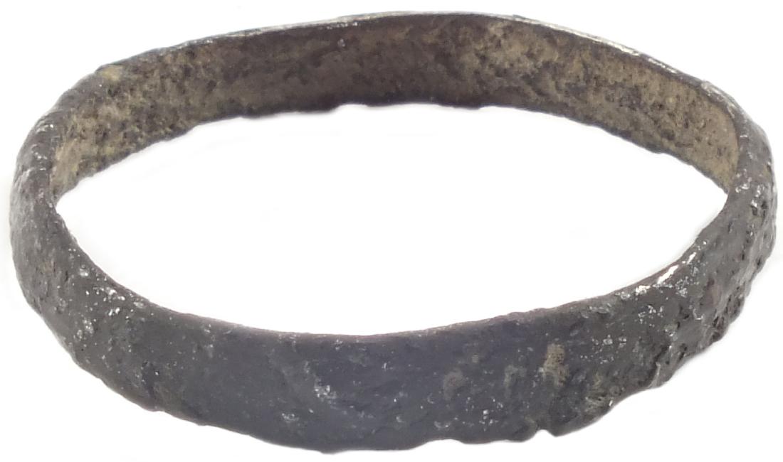 ANCIENT VIKING WOMAN’S WEDDING RING 10th-11th CENTURY: Bronze, size 7. Narrow round band with irregularities as made (cast). Vikings exchanged rings on the pommel of the groom’s sword. All items purchased are accompanied by a signed and dated Certificat