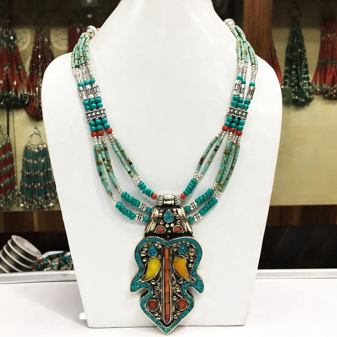 Vintage Tibetan Silver Turquoise & Coral Necklace: Tibetan Buddhist Turquoise & Coral Vintage Tibet Necklace. 18 inches. Tibetan silver (White metal) Please note that this lot has a confidential reserve. When you leave a bid in advance of the auction,