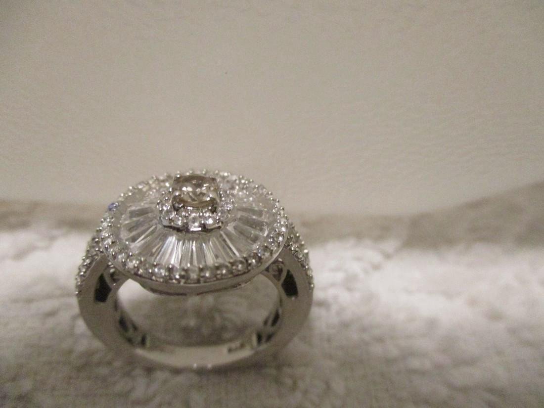 Platinum Sterling Silver Turkizite Zircon Ring, 2.79ctw: Item: Ring Turkizite,White Zircon Platinum Over Sterling Silver Brand: STS Metal Purity: 925 Materials: Turkizite,White Zircon Platinum Over Sterling Silver Carat Weights: TGW 2.790cts Ring Size: 6 Pl