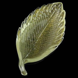 Salviati Murano Gold Leafs Italian Art Glass Dish: Murano hand blown gold flecks Italian art glass leaf shaped ring dish. Documented the Salviati company. Measures 4 3/4" long. Please note that this lot has a confidential reserve. When you leave a