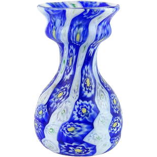 Fratelli Toso Murano Millefiori Italian Art Glass Vase: Beautiful Murano hand blown millefiori flower mosaic art glass cabinet / bud vase. Documented to the Fratelli Toso company. Unusual striped design, in white, blue, and yellow colors. The pieces date