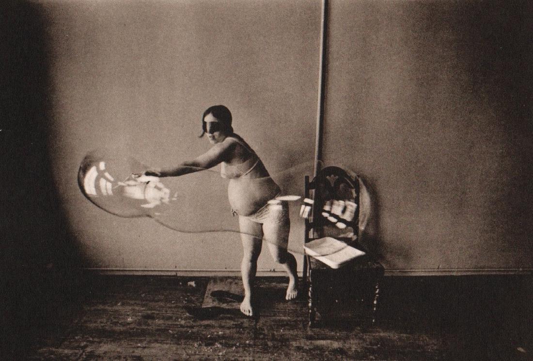 LESLIE KRIMS - Blowing Bubbles: Artist: LESLIE KRIMS Print Title: Blowing Bubbles Medium: Sheet-fed Gravure Printing Date: 1970>li>Printed in the USA Image Size: 7.5" x 5" Leslie Robert Krims is a conceptualist photographer living i