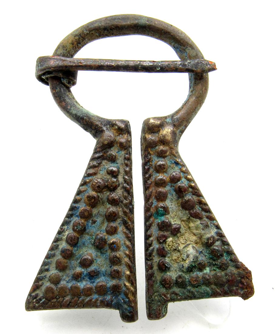 Viking Penannular Omega Brooch with Decoration: Date: ca. 900 - 1100 AD Material: Bronze Dimensions: 58MM - 22.9GRAMS Provenance/Additional Information: Obtained from an old British collection, purchased from a gentleman in London. Rare Viking Scan
