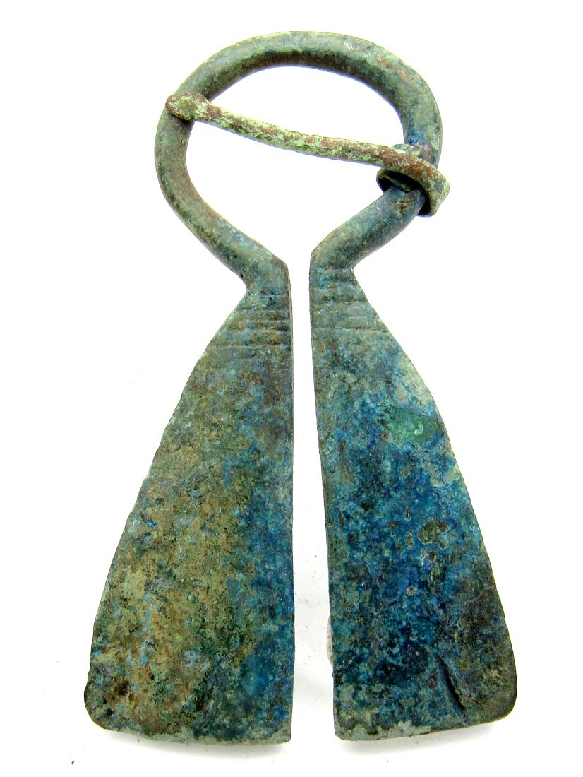 Viking Penannular Omega Brooch with Decoration: Date: ca. 900 - 1100 AD Material: Bronze Dimensions: 62mm - 16.1 Grams Provenance/Additional Information: Obtained from an old German collection; purchased in Berlin. Rare Viking Scandinavian peannula