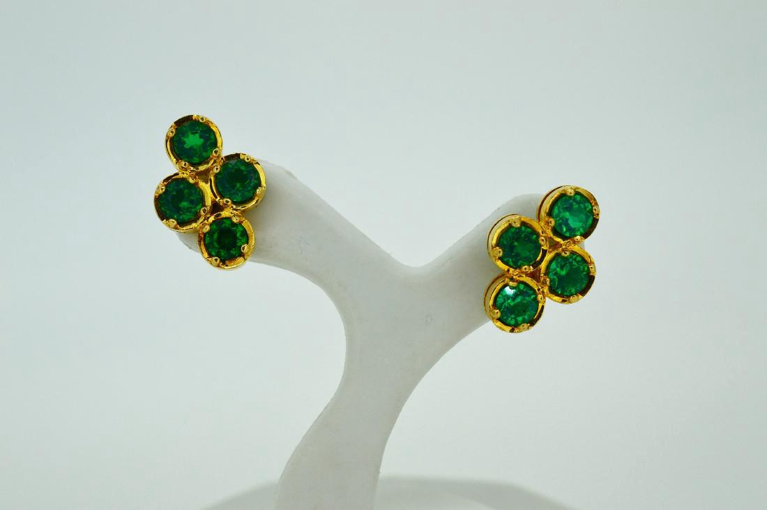 18k Yellow Gold & Beryl Stud Earrings: Item: 18k Yellow Gold & Beryl Stud Earrings Brand: Unbranded Metal Purity: .750 Gold Gemstones: Beryl Four (4) round beryl stones set in 18k yellow gold Please note that this lot has a confidential re